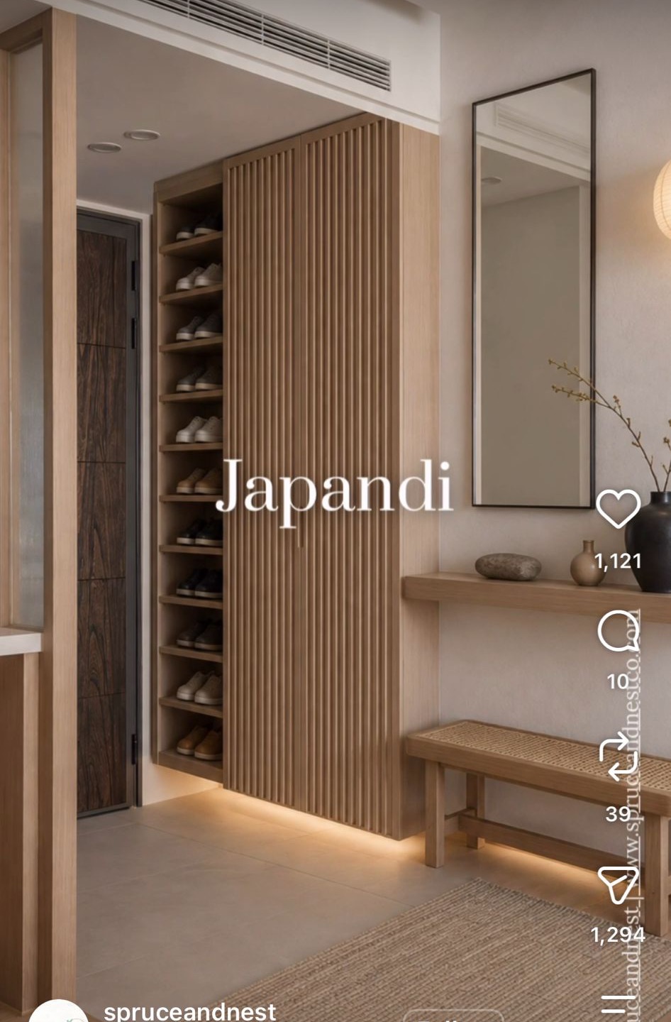 Entryway reference: fluted oak cabinet with open shoe shelves beside it, floating shelf, mirror and a rattan bench