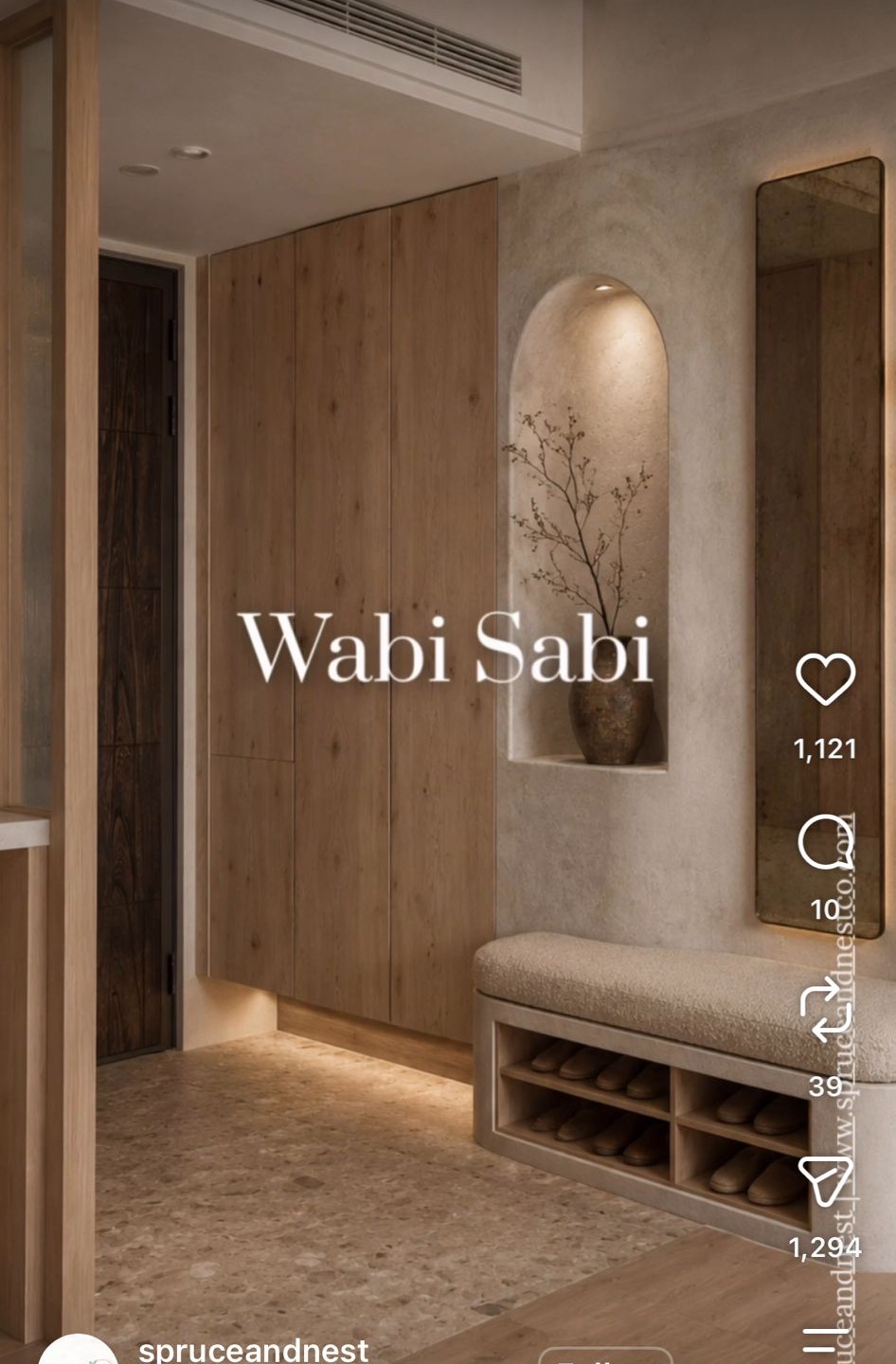 Entryway reference: oak full-height cabinets, arched limewash niche with a branch, upholstered bench with open shoe cubbies below