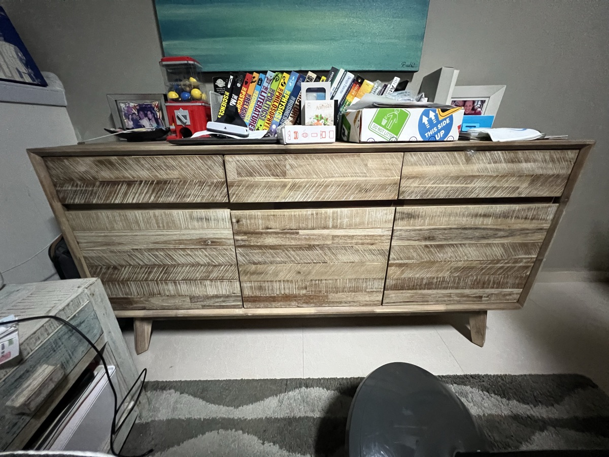Existing master bedroom sideboard: reclaimed-look timber, three drawers over three doors, tapered legs